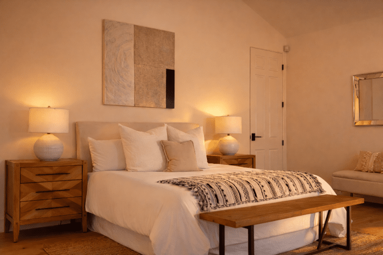 luxury home staging of a primary suite in a home in palisades highlands